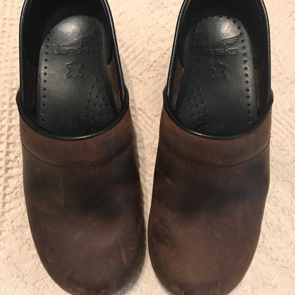 dansko brown oiled leather clogs